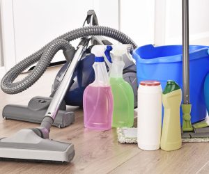 Variety of detergent bottles and chemical cleaning supplies